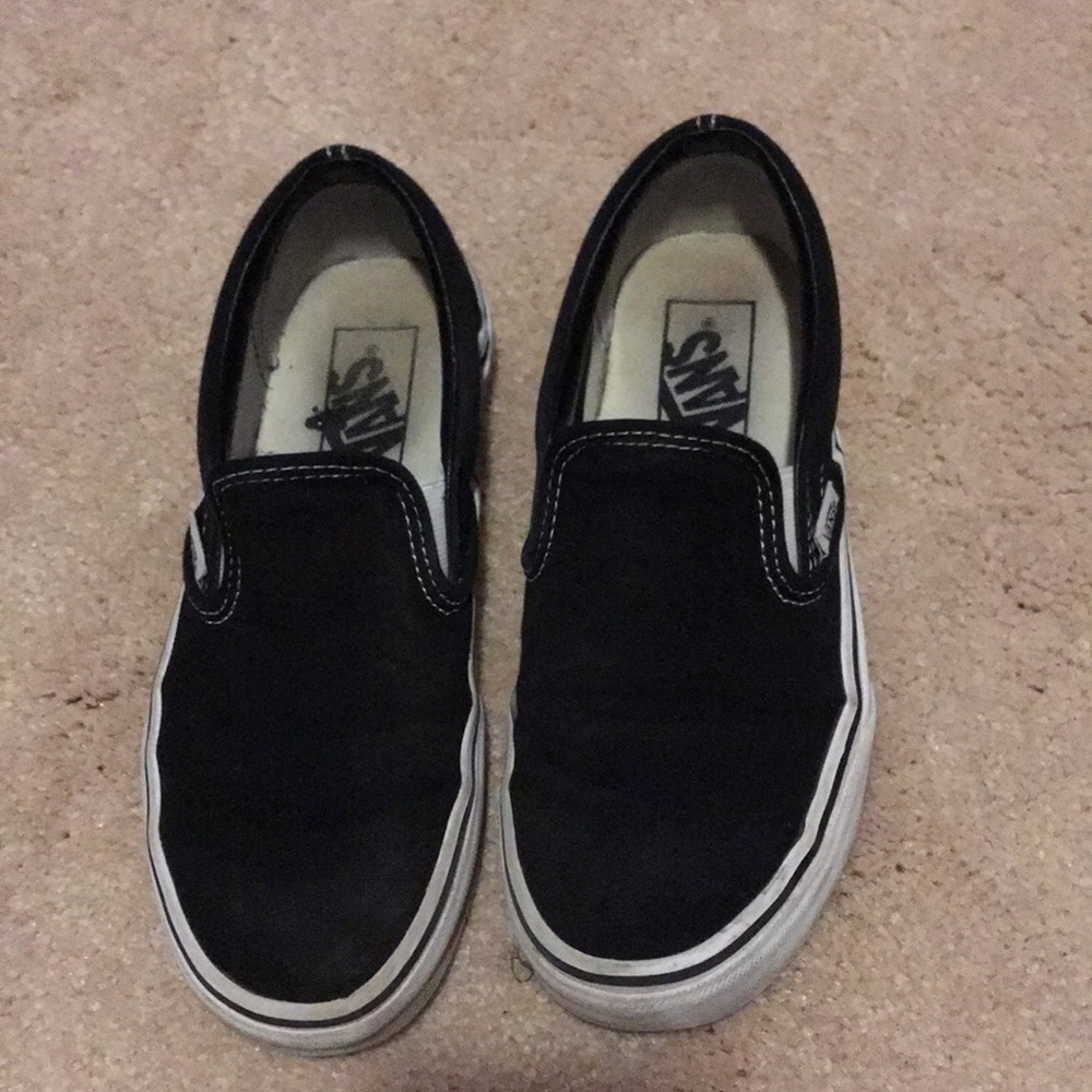 black and white slip on vans